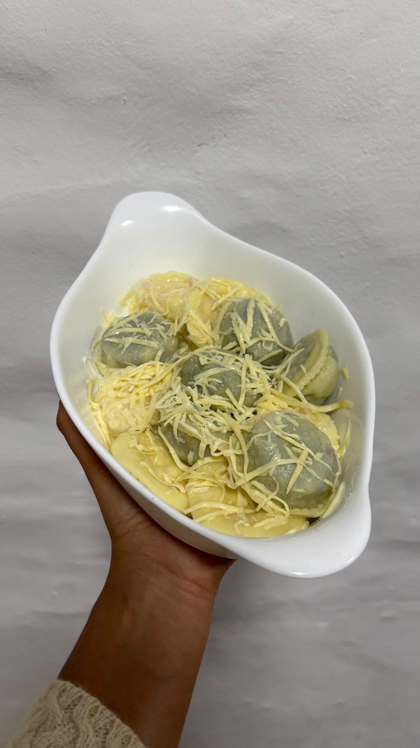 Sorrentinos artesanales TUCCI servidos con queso